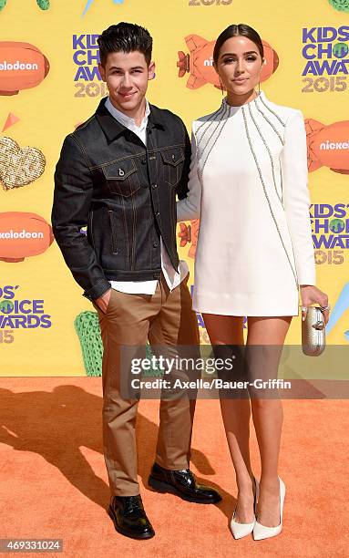 Singer Nick Jonas and actress Olivia Culpo arrive at Nickelodeon's 28th Annual Kids' Choice Awards at The Forum on March 28, 2015 in Inglewood,...