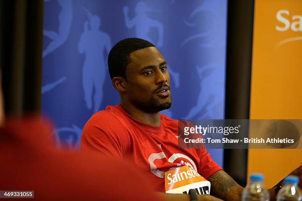 David Oliver of the USA talks to the press during the press conference prior to the Sainsbury's Indoor Grand Prix at the Crowne Plaza Hotel on...