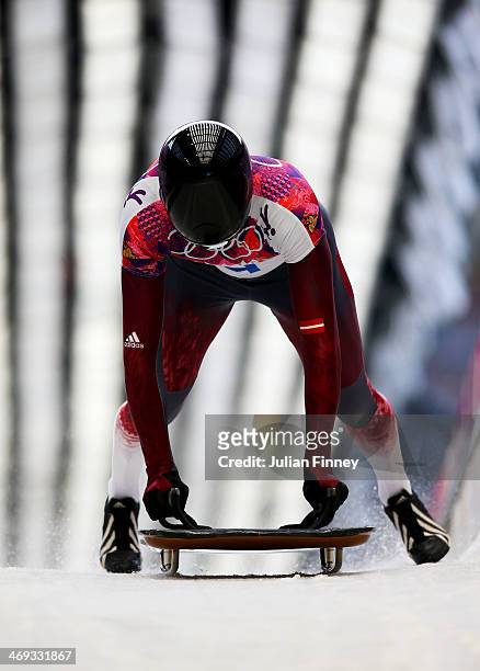 Tomass Dukurs of Latvia finishes a run during the Men's Skeleton heats on Day 7 of the Sochi 2014 Winter Olympics at Sliding Center Sanki on February...