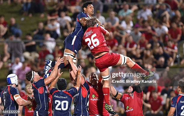 Lopeti Timani of the Rebels and Curtis Browning of the Reds compete at the lineout during the Super Rugby trial match between the Queensland Reds and...