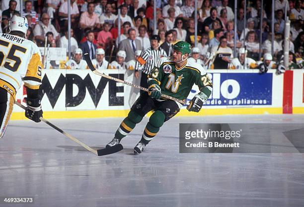 Brian Bellows of the Minnesota North Stars skates on the ice against the Pittsburgh Penguins during Game 1 of the 1991 Stanley Cup Finals on May 15,...