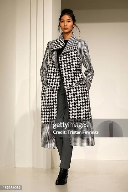 Model is seen during the Haizhen Wang presentation at London Fashion Week AW14 at Somerset House on February 14, 2014 in London, England.