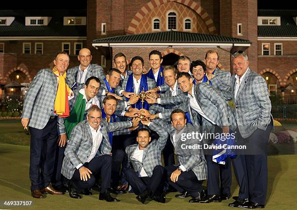 The victorious European Team celebrate with the cup after their famous comeback in the Singles Matches for The 39th Ryder Cup at Medinah Country Club...