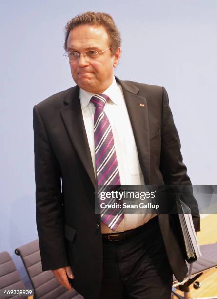 In this file photo dated July 18 German Agriculture and Consumer Protection Minister Hans-Peter Friedrich, who was then Minister of Interior, departs...