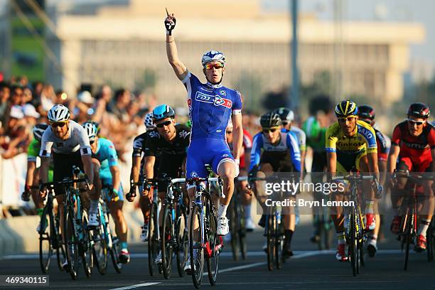 Arnaud Démare of France and FDJ.fr celebrates winning stage six of the Tour of Qatar from Sealine Beach Resort to Doha Corniche on February 14, 2014...