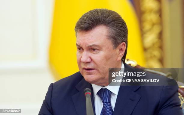 Ukrainian President Viktor Yanukovych delivers a speech in Kiev on February 14, 2014 as he met with veterans of the Soviet era war in Afghanistan to...