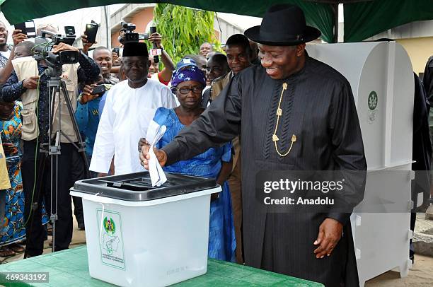 Nigeria's President Goodluck Jonathan casts his vote at Ward 13 Unit 39 Otuoke polling station to cast his votes during the Governorship election in...