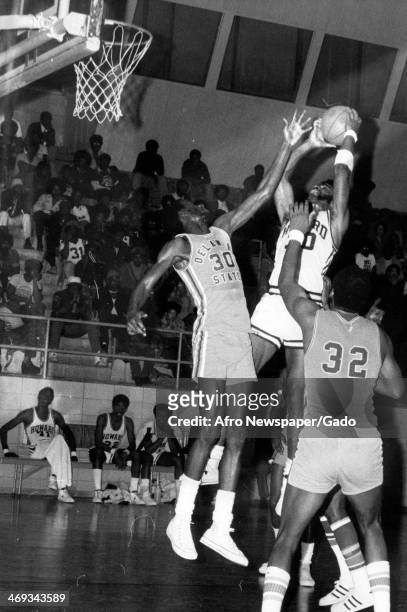 Photograph of Vadney Cotton playing basketball for Howard University, Washington, DC, 1980.
