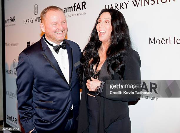 Kevin Robert Frost and Cher attend the 5th Annual amfAR Inspiration Gala at the home of Dinho Diniz on April 10, 2015 in Sao Paulo, Brazil.