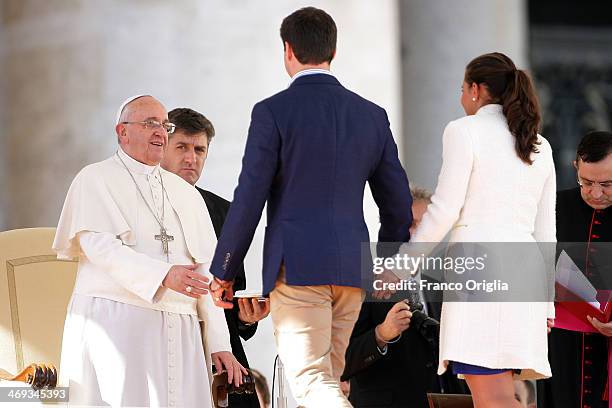 Pope Francis attends a meeting with engaged couples from all over the world gathered today, on the feast of St. Valentine, in St. Peter's Square on...