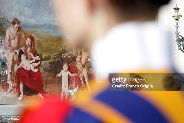 Peinture framed by a Swiss guard is seen during a meeting of Pope Francis with engaged couples from all over the world gathered today, on the feast...
