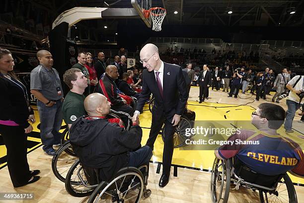Commissioner Adam Silver shakes hands during the NBA/WNBA Wheelchair All-Star Game as part of 2014 NBA All-Star Jam Session at the Ernest N. Morial...