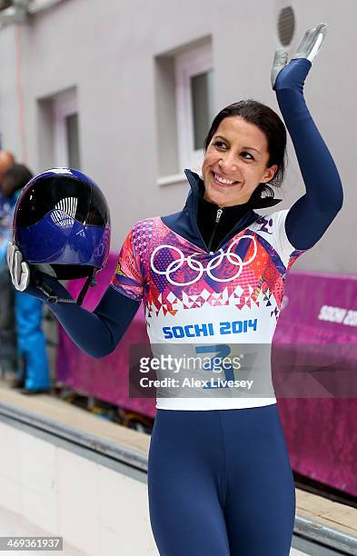 Shelley Rudman of Great Britain waves to the fans after competing a run during the Women's Skeleton on Day 7 of the Sochi 2014 Winter Olympics at...