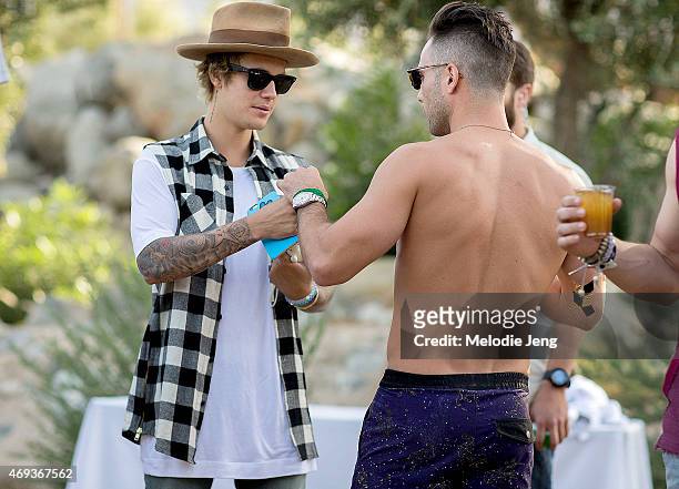Justin Bieber, wearing a Nick Fouquet hat, attends the Views from The One party at The dFm House during the 2015 Coachella Valley Music And Arts...