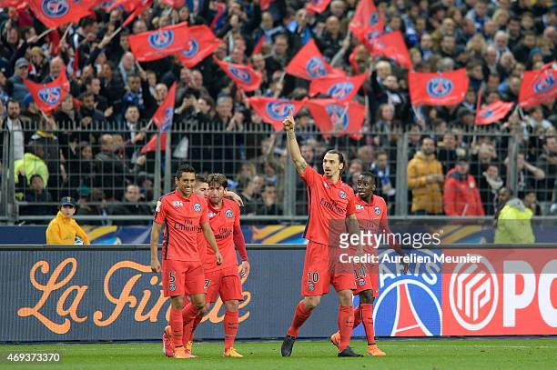 Zlatan Ibrahimovic of PSG, reacts after scoring his second goal of the night with teammates Marquinhos , Maxwell and Blaise Matuidi during the French...