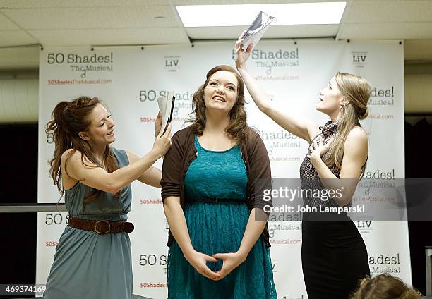 Kaitlyn Frotton, Amber Petty and Chloe Williamson perform at the "50 Shades! The Musical" Press Preview at The Snapple Theater Center on February 14,...