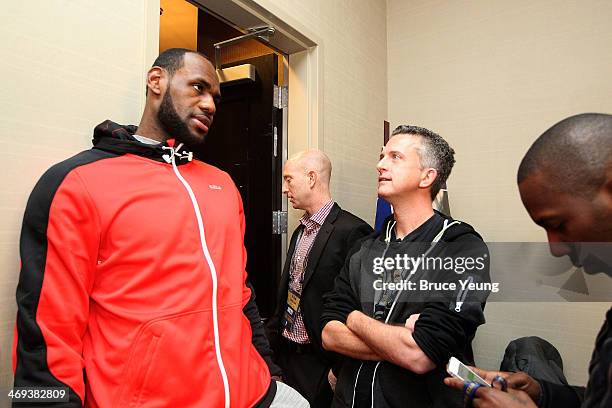 LeBron James of the Miami Heat speaks with sports analyst Bill Simmons during the NBAE Circuit as part of 2014 All-Star Weekend at the Hyatt Regency...