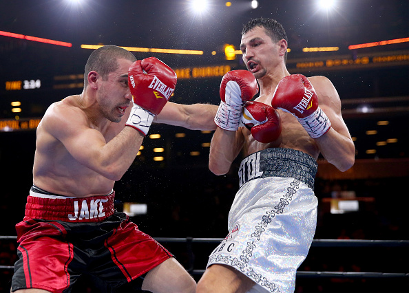 Postol Viktor Postol of Ukraine and Jake Giuriceo exchange punches during ...
