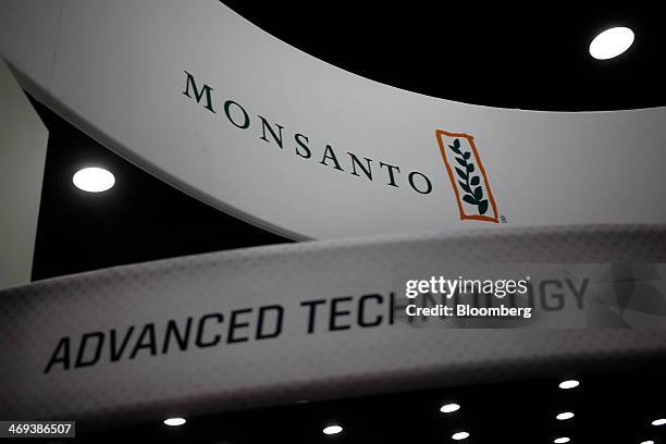 The Monsanto Co. Logo and signage are displayed at the company's booth at the National Farm Machinery Show in Louisville, Kentucky, U.S. On Thursday,...