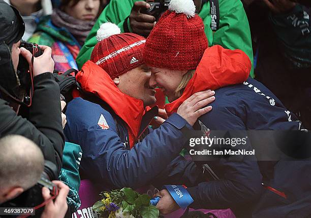 Lizzy Yarnold of Great Britain celebrates with her boy friend James Roache after winning the Women's Skeleton Final on Day 7 of the Sochi 2014 Winter...