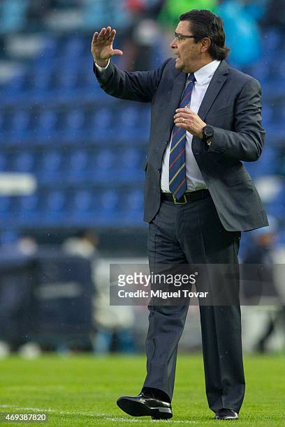Luis Tena head coach of Cruz Azul gives directions to his players during a match between Cruz Azul and Tigres UANL as part of 13th round Clausura...