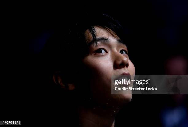 Yuzuru Hanyu of Japan celebrates after winning the gold medal in the Figure Skating Men's Free Skating on day seven of the Sochi 2014 Winter Olympics...