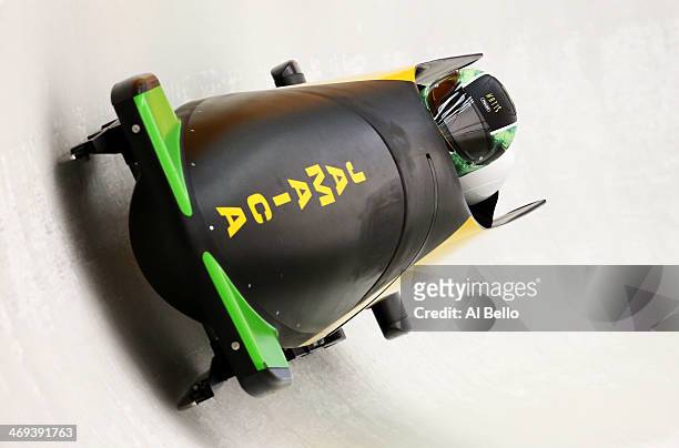Winston Watts of Jamaica pilots a run during a Men's Two-Man Bobsleigh training session on day 7 of the Sochi 2014 Winter Olympics at the Sanki...