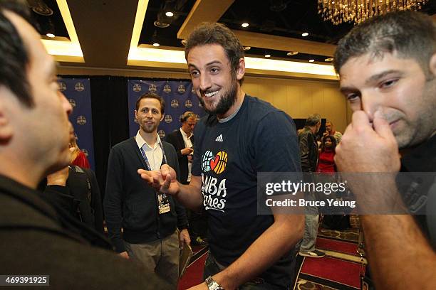 Marco Belinelli of the San Antonio Spurs speaks with reporters during NBA All Star Press Conferences and Media Availability as part of 2014 All-Star...