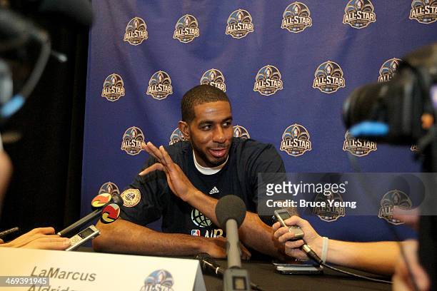 LaMarcus Aldridge of the Portland TrailBlazers answers questions during NBA All Star Press Conferences and Media Availability as part of 2014...