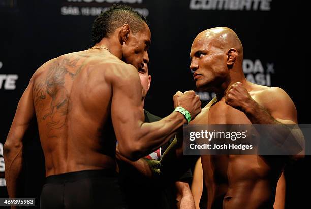 Opponents Yuri Alcantara and Wilson Reis face off during the UFC weigh-in at Arena Jaragua on February 14, 2014 in Jaragua do Sul, Santa Catarina,...