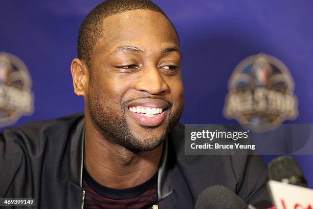 Dwyane Wade of the Miami Heat answers questions during NBA All Star Press Conferences and Media Availability as part of 2014 All-Star Weekend at the...