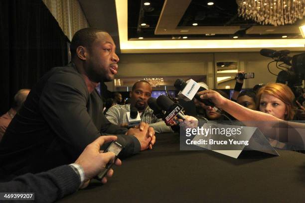 Dwyane Wade of the Miami Heat answers questions during NBA All Star Press Conferences and Media Availability as part of 2014 All-Star Weekend at the...