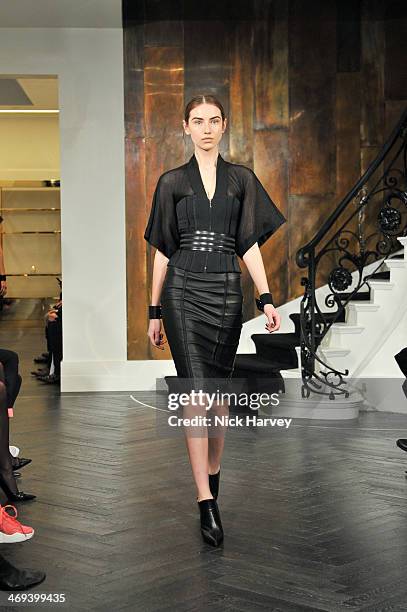Model walks during the Amanda Wakeley presentation at London Fashion Week AW14 at on February 14, 2014 in London, England.