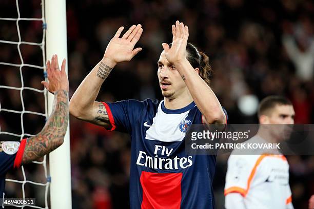 Paris' Swedish forward Zlatan Ibrahimovic reacts after Paris Saint Germain scored during the French L1 football match between Paris Saint-Germain and...