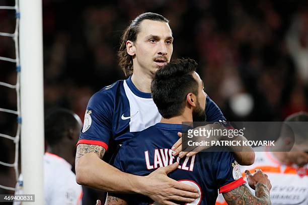 Paris' Swedish forward Zlatan Ibrahimovic and Argentine teammate forward Ezequiel Lavezzi react after Paris Saint Germain scored during the French L1...