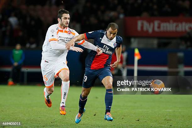 Paris' Brazilian forward Lucas Moura vies for the ball with Valenciennes' French midfielder Marco Da Silva during the French L1 football match...