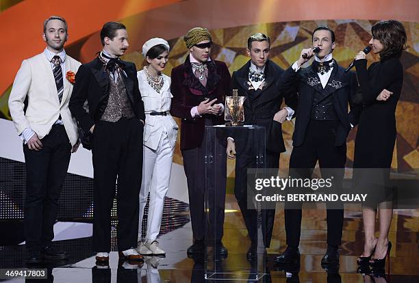 French band La Femme deliver a speech after receiving the best newcomer's album of the year award for their album "Psycho Tropical Berlin", next to...