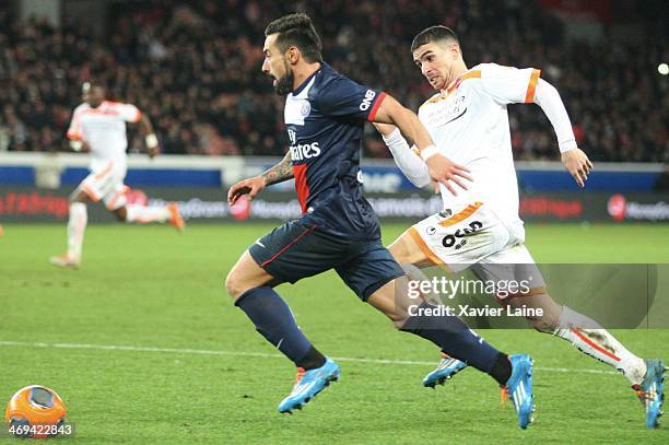 Ezequiel Lavezzi of Paris Saint-Germain and Waris Majeed of Valenciennes VAFC in action during the French Ligue 1 between Paris Saint-Germain FC and...