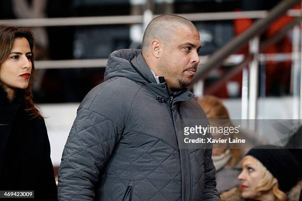 Ronaldo Luis Nazario and his girlfriend attend the French Ligue 1 between Paris Saint-Germain FC and Valenciennes VAFC at Parc Des Princes on...