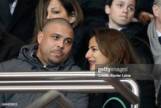 Ronaldo Luis Nazario and his girlfriend attend the French Ligue 1 between Paris Saint-Germain FC and Valenciennes VAFC at Parc Des Princes on...