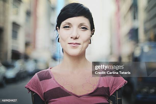 Woman with tatoos on the street