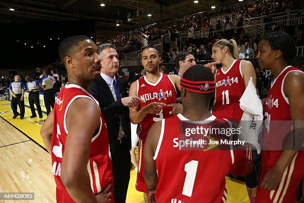 Personality Bill Simmons Coach of the West Team talks to his players during the Sprint NBA All-Star Celebrity Game at Sprint Arena during the 2014...