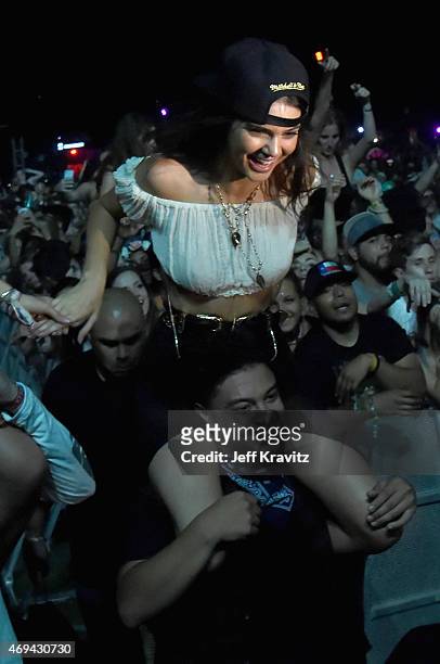 Model Kendall Jenner and Alfredo Flores in the audience during day 2 of the 2015 Coachella Valley Music & Arts Festival at the Empire Polo Club on...