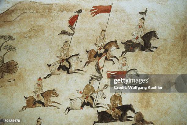 Murals picturing soldiers on horseback on the wall of the Qianling Mausoleum, a Tang Dynasty tomb site located in Qian County, Shaanxi province,...