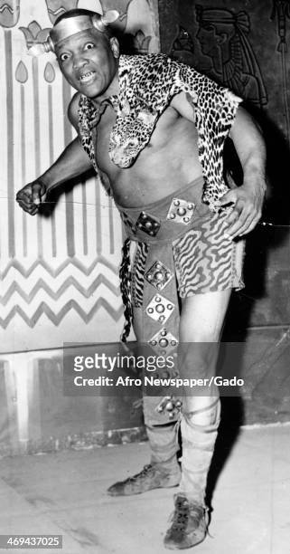 Jack Johnson, professional boxer, in costume for his role in the play Aida at the Hippodrome Opera Company, New York, New York, 1936.