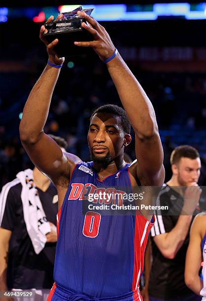 Team Hill's Andre Drummond of the Detroit Pistons celebrates with the trophy after defeated Team Webber during the BBVA Compass Rising Stars...