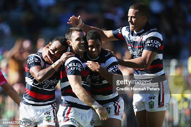 Brad Fittler of the Roosters celebrates after scoring a try during the match between Sydney Roosters and the Brisbane Broncos in the Auckland NRL...