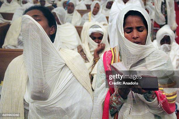 Orthodox believers attend an Orthodox Easter service in the Holy Trinity Cathedral in Addis Ababa, Ethiopia on April 12, 2015.