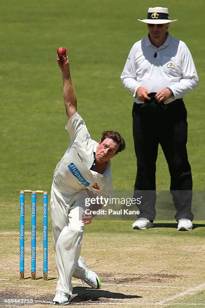 Andrew Fekete of the Tigers bowls during day four of the Sheffield Shield match between the Western Australia Warriors and the Tasmania Tigers at the...