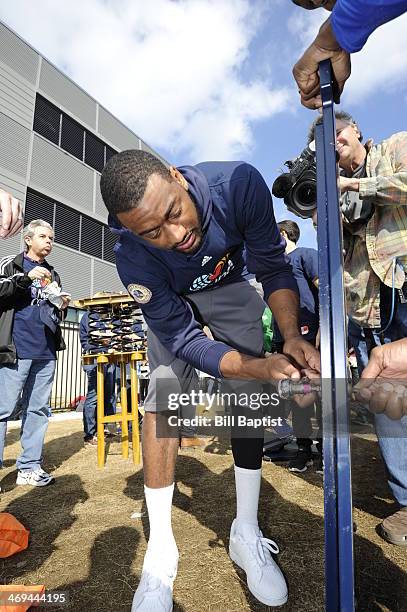 John Wall of the Washington Wizards puts together a play set during the NBA Cares All-Star Day of Service "PLAY" with KaBOOM as part of the 2014 NBA...